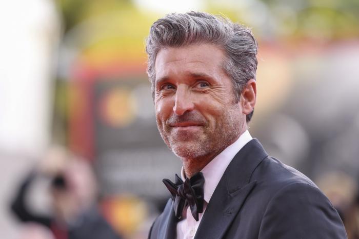 Patrick Dempsey poses for photographers upon arrival for the premiere of the film "Ferrari" during the 80th edition of the Venice Film Festival, Aug. 31, 2023, in Venice, Italy.