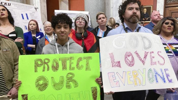 Transgender-rights advocates gather near the Kentucky House chamber, March 2, 2023, in Frankfort, Ky.