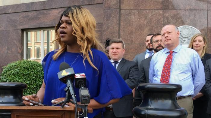 Lead plaintiff Kayla Gore speaks at a news conference outside the federal courthouse in Nashville, Tenn., Tuesday, April 23, 2019.