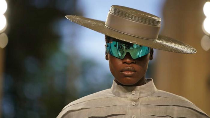 A model wears a creation by Louis Vuitton during a fashion show for the Cruise 2025 collection in the Park Guell in Barcelona, Spain, Thursday, May 23, 2024