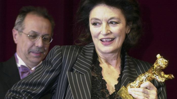 French actress Anouk Aimee holds a Golden Bear award which she was given for lifetime achivement at the 53rd Berlinale Film Festival in Berlin Thursday, Feb. 13, 2003.