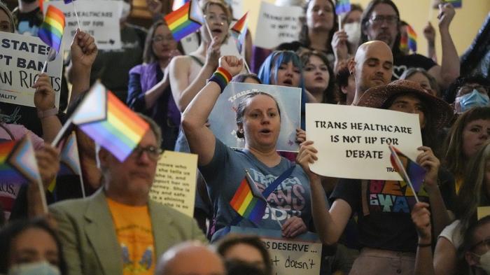 LGBTQ+ activists protest Senate Bill 14, that would ban gender-affirming medical care for transgender children, at the Texas Capitol, Friday, May 12, 2023, in Austin, Texas. 