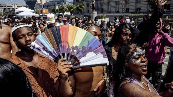 Revelers dance to the music at the hip-hop stage during pride celebrations at Civic Center in San Francisco, Saturday, June 29, 2024.