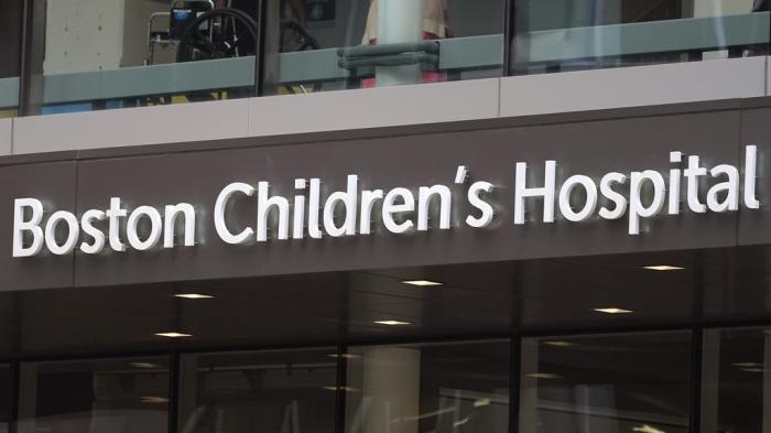 A sign hangs on the Boston Children's Hospital, Aug. 18, 2022, in Boston.