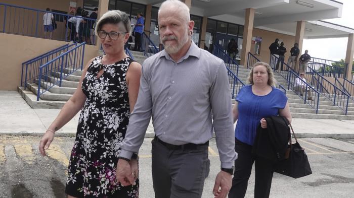 Jessica and Gary Norton, parents of a transgender student and volleyball player formerly of Monarch High School, leave a Broward County School Board meeting at Plantation High School, Tuesday, July 23, 2024. 