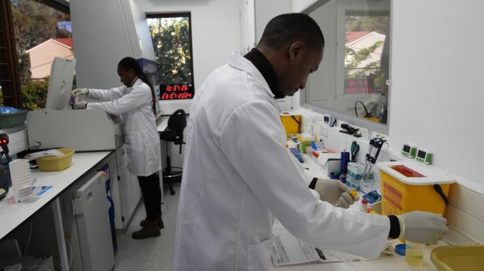 Lab technician, Xolile Mhlanga, works with vials of lenacapavir at the Desmond Tutu Health Foundation's Masiphumelele Research Site, in Cape Town, South Africa, Tuesday, July 23, 2024.