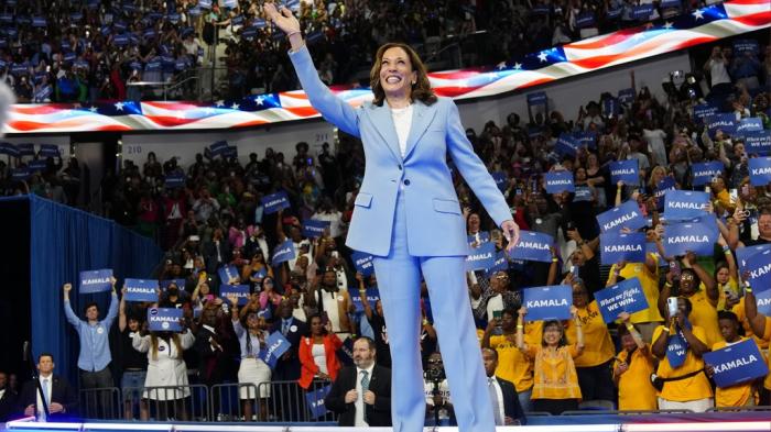 Vice President Kamala Harris waves during a campaign rally, Tuesday, July 30, 2024, in Atlanta. 