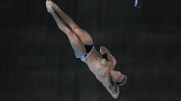 Germany's Timo Barthel competes in the men's 10m platform diving preliminary, at the 2024 Summer Olympics, Friday, Aug. 9, 2024, in Saint-Denis, France. 