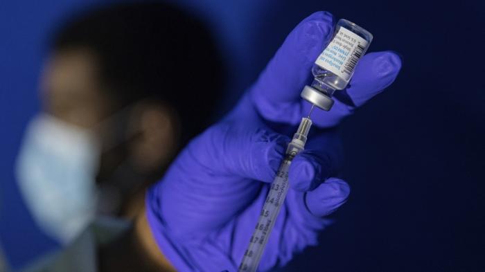 Family nurse practitioner Carol Ramsubhag-Carela prepares a syringe with the Mpox vaccine before inoculating a patient at a vaccinations site on, Aug. 30, 2022, in the Brooklyn borough of New York.