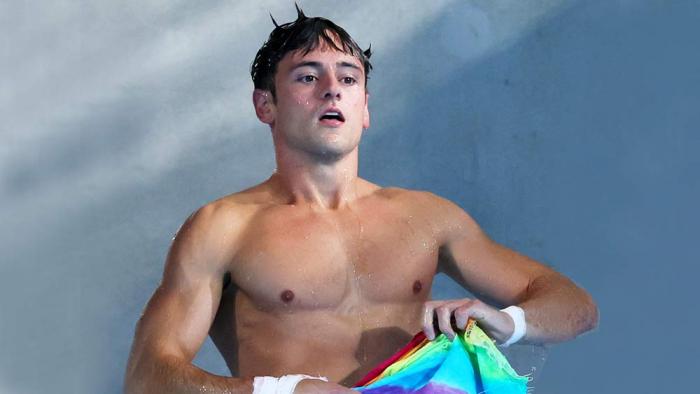 Thomas Daley of Team Great Britain, uses a rainbow towel after competing in the Men's Synchronised 10m Platform Final on day three of the Olympic Games Paris 2024 at Aquatics Centre on July 29, 2024 in Paris, France. (Photo by Clive Rose/Getty Images)