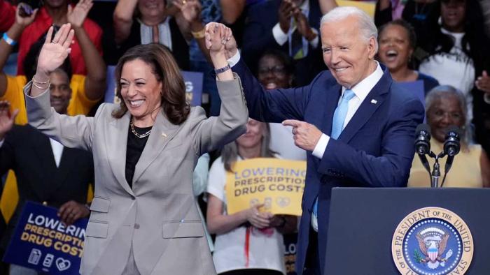 President Joe Biden and Vice President Kamala Harris finish speaking about their administration's efforts to lower prescription drug costs during an event at Prince George's Community College in Largo, Md., Thursday, Aug. 15, 2024