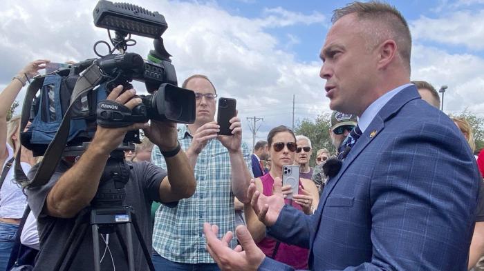 State Rep. Justin Sparks, R-Wildwood, fields questions from reporters during a press conference to address a transgender woman using the women's locker room at the Life Time fitness center in Ellisville, Mo., Friday, Aug. 2.