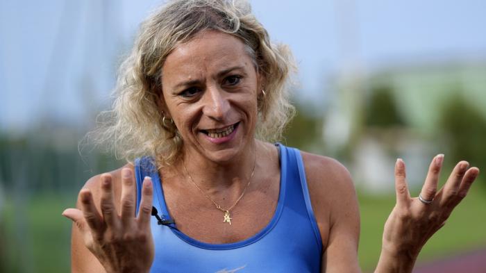 Italy's Valentina Petrillo gestures during an interview with The Associated Press in Pieve di Cento, near Bologna, Italy, Monday, Aug. 19, 2024.