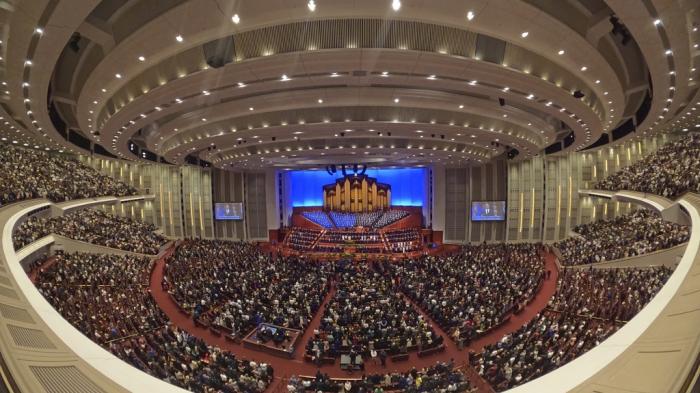 This image made with a fisheye lens shows people attending the twice-annual conference of the Church of Jesus Christ of Latter-day Saints, on April 7, 2024, in Salt Lake City.