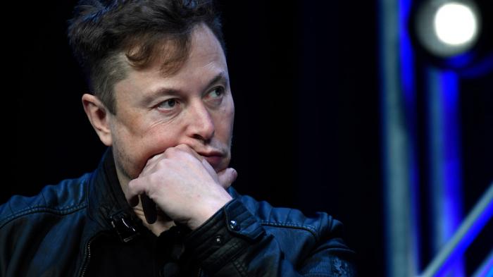 Tesla and SpaceX chief executive officer Elon Musk listens to a question as he speaks at the SATELLITE Conference and Exhibition in Washington, March 9, 2020