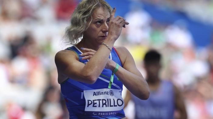 Italy's Valentina Petrillo prepares to compete in the women's 400m T12 round 1, at the Stade de France Stadium, during the 2024 Paralympics, Monday, Sept. 2, 2024, in Paris, France. 