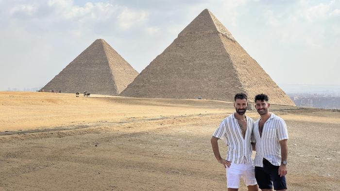 This 2023 photo shows Stefan Arestis, right, and Sebastien Chaneac, at the Pyramids in Egypt.