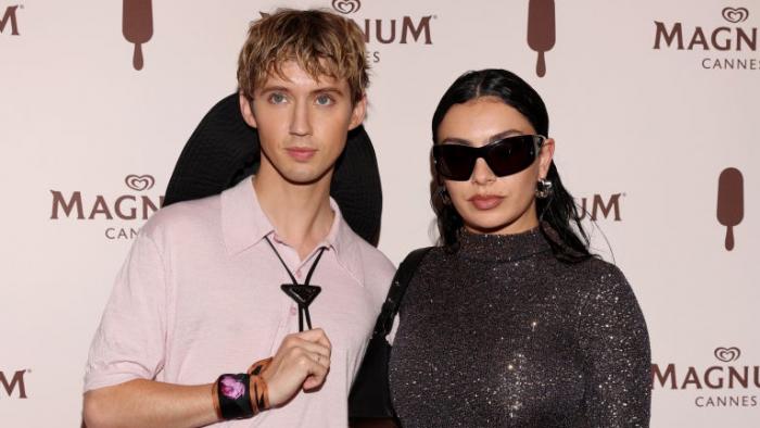 Troye Sivan and Charli XCX arrive at the Magnum?Wherever Pleasure Takes You?party at Magnum Beach on May 16, 2024 in Cannes, France. 