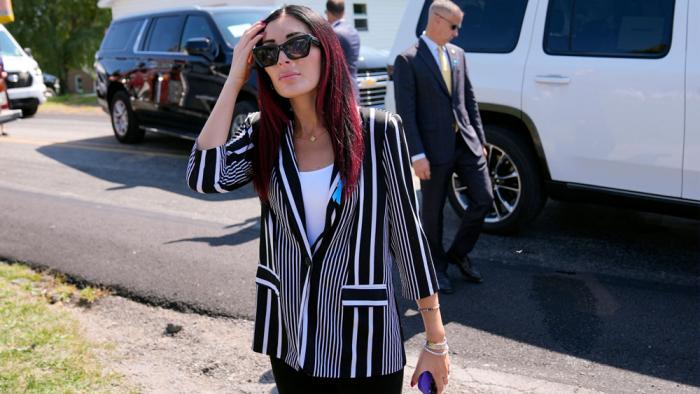 Laura Loomer arrives with Republican presidential nominee former President Donald Trump for a visit to the Shanksville Volunteer Fire Company in Shanksville, Pa., Wednesday, Sept. 11, 2024