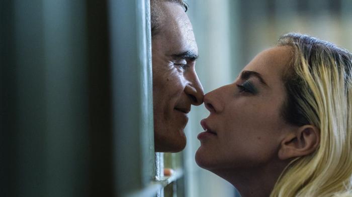 Joaquin Phoenix, left, and Lady Gaga in a scene from "Joker: Folie à Deux."