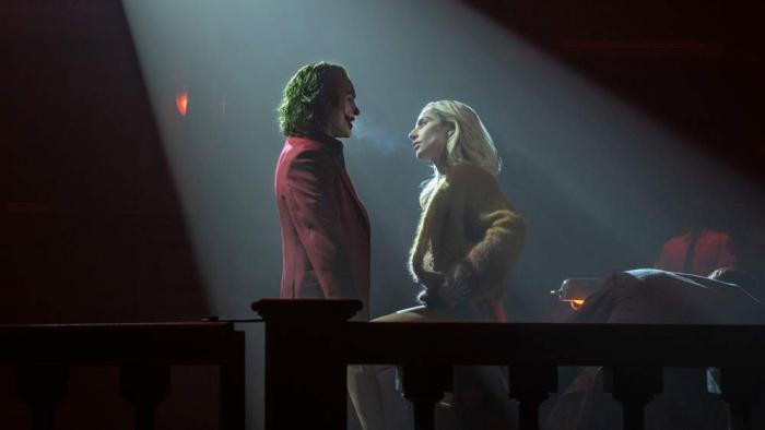 This image released by Warner Bros. Pictures shows Joaquin Phoenix, left, and Lady Gaga in a scene from 'Joker: Folie à Deux'