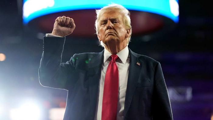 President-elect Donald Trump gestures at a campaign rally at the Santander Arena, Wednesday, Oct. 9, 2024, in Reading, Pa