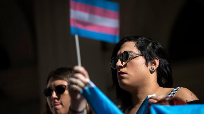 L.G.B.T. activists and their supporters rally in support of transgender people on the steps of New York City Hall, October 24, 2018 in New York City. 