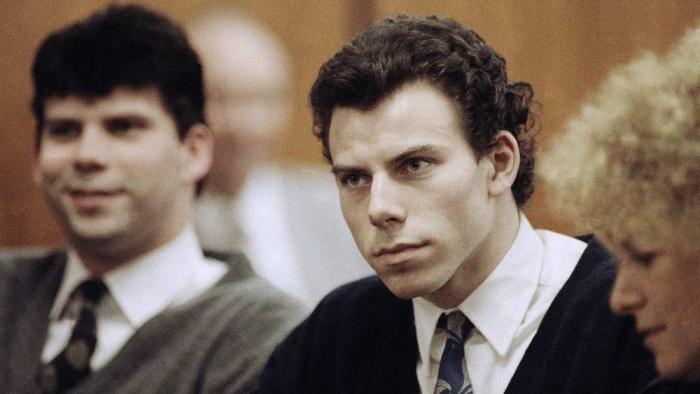 Lyle, left, and Erik Menendez sit with defense attorney Leslie Abramson, right, in the Municipal Court in the Beverly Hills area of Los Angeles, during a hearing, Nov. 26, 1990