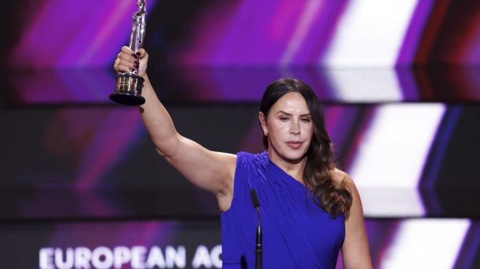 Karla Sofia Gascon, of Spain, winner of the European Actress category for "Emilia Perez", accepts her award during the European Film Awards gala at the Culture and Convention Center KKL in Lucerne, Switzerland, Saturday, Dec. 7, 2024.