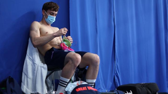 Tom Daley of Team Great Britain is seen knitting before the Men's 10m Platform Final on day fifteen of the Tokyo 2020 Olympic Games at Tokyo Aquatics Centre on August 07, 2021 in Tokyo, Japan.