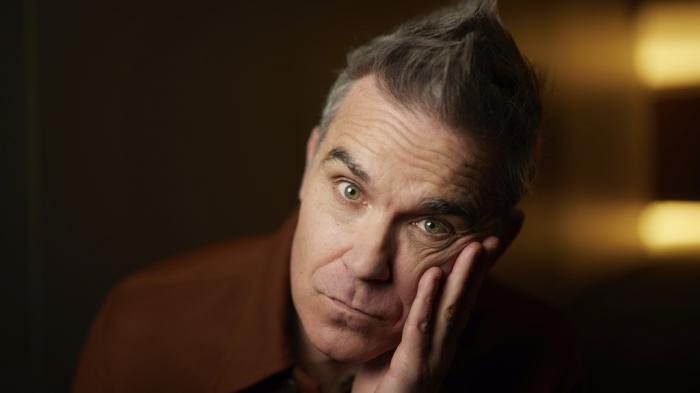 Robbie Williams poses for a portrait to promote the film "Better Man" on Wednesday, Nov. 13, 2024, in New York. 