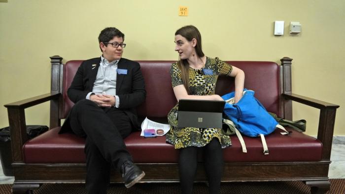 State Rep. Zooey Zephyr, right, speaks with colleague Rep. SJ Howell after House Speaker Matt Regier told her she could not work from the hallway just outside the main chamber of the House, April 27, 2023 in Helena, Mont.