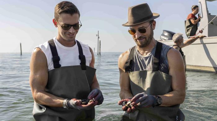 Antoni Porowski, left, and Justin Theroux, right in "No Taste Like Home with Antoni Porowski."