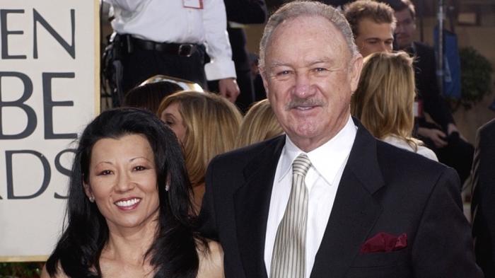 Actor Gene Hackman arrives with his wife, Betsy Arakawa, for the 60th Annual Golden Globe Awards in Beverly Hills, Calif., Sunday, Jan. 19, 2003. 