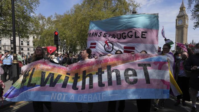 Campaigners take part in a rally organised by trans rights groups, trade unions, and community organisations following the Supreme Court ruling on the definition of a woman in equalities law, at Parliament Square, central London, Saturday April 19, 2025. 