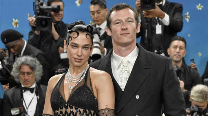 Dua Lipa, left, and Callum Turner attend The Metropolitan Museum of Art's Costume Institute benefit gala on May 5, 2025, in New York. 