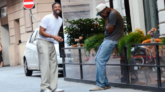 Jussie Smollett (left) is seen in the moment he proposed to his bf Jabari Redd in snaps taken by photographer @artbyalyx.