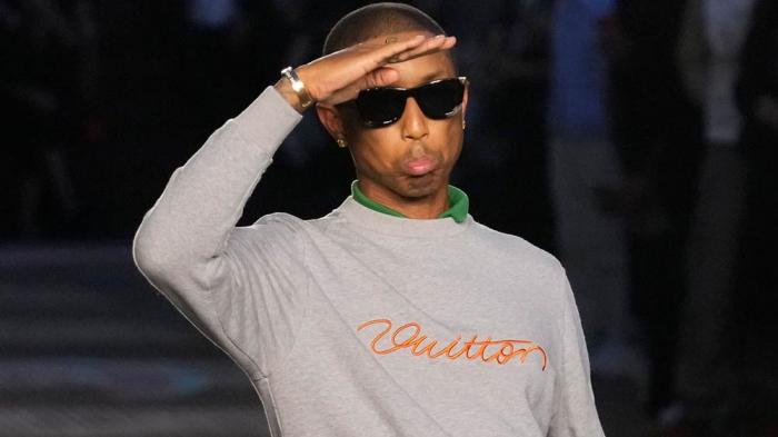 Designer Pharrell Williams takes the stage after the men's Louis Vuitton Spring-Summer 2026 collection, that was presented in Paris, Tuesday, June 24, 2025