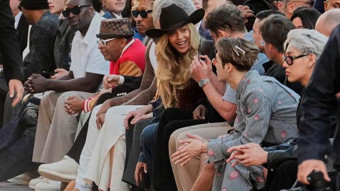 Beyonce, center, attends the men's Louis Vuitton Spring-Summer 2026 collection, that was presented in Paris, Tuesday, June 24, 2025