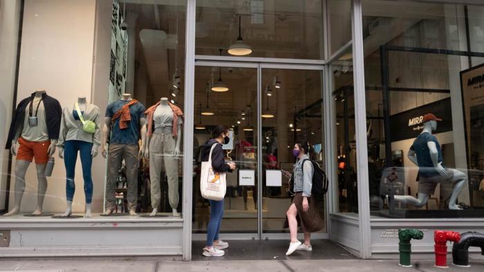 Lululemon fashions are displayed in company store windows, March 25, 2021, in New York