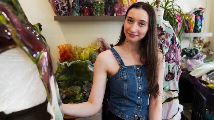 Fashion designer Caroline Zimbalist poses in her studio on Friday, June 6, 2025, in the Queens borough of New York