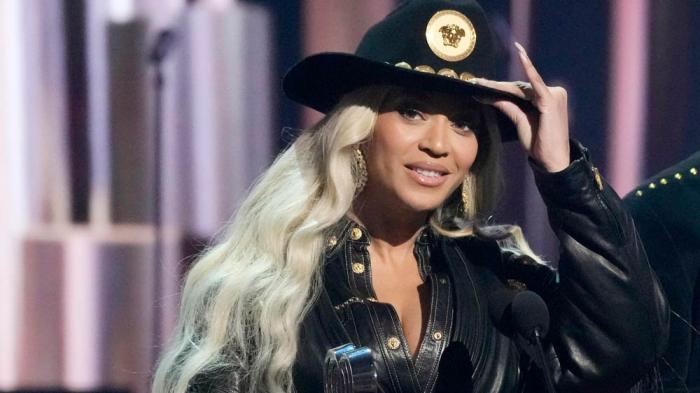 Beyonce, left, accepts the Innovator Award during the iHeartRadio Music Awards, April 1, 2024, at the Dolby Theatre in Los Angeles