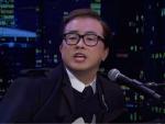 Watch: Bowen Yang - as George Santos - Bids Goodbye to SNL with 'Scandals in the Wind'